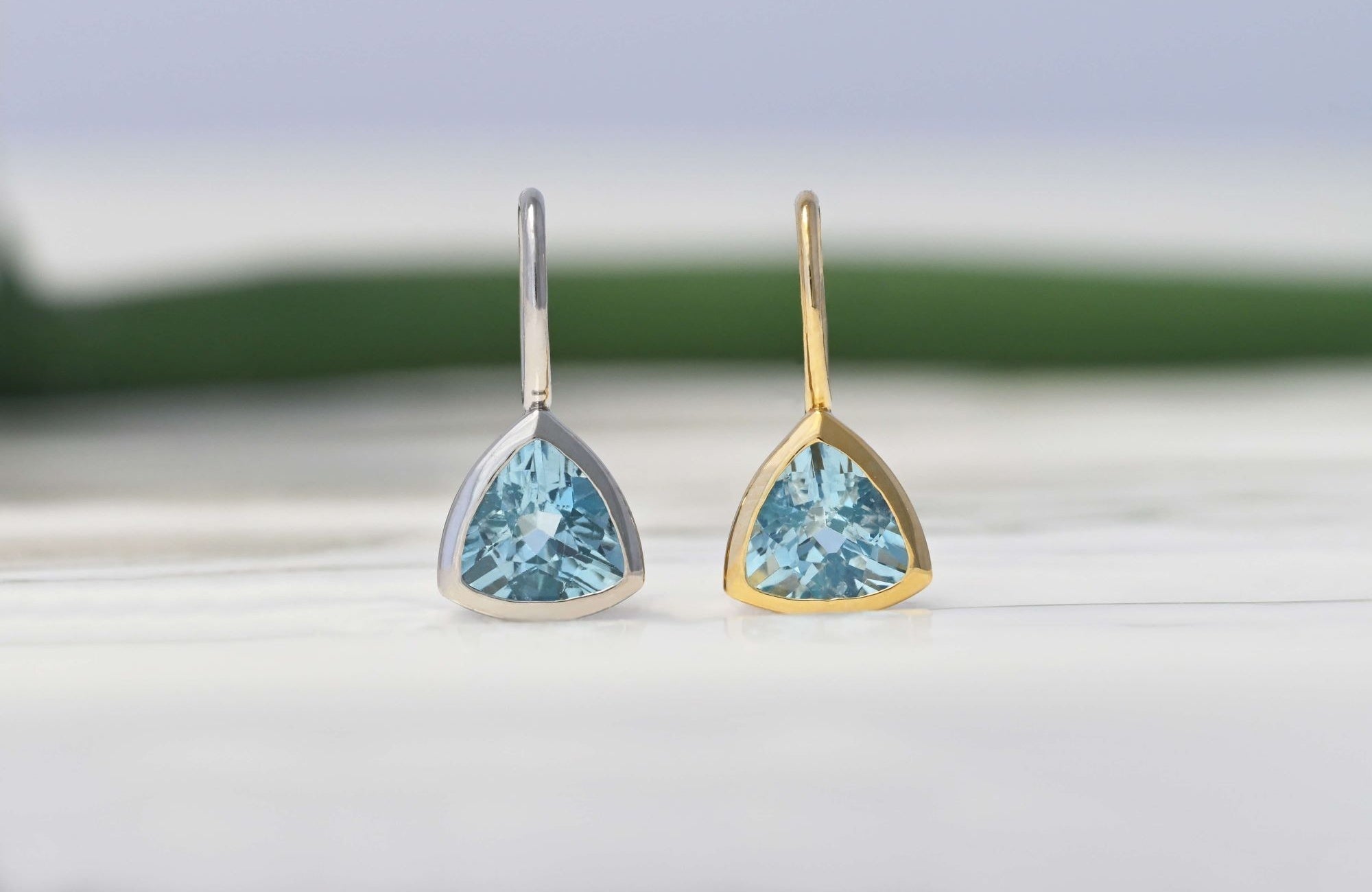 Ocean Prism Aquamarine Pendant in yellow and white gold trillion-cut settings