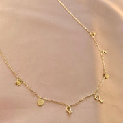 14k Solid Gold Multi Charm Necklace